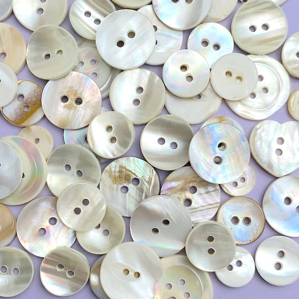 White Shell Stragglers, One Pound Mixed Sizes/Styles: 300+ Mother of Pearl Shell Buttons, $25.00  #D-1025