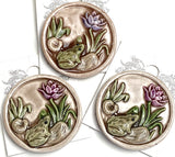 Frog, Lighter Purple Flower, Lilypad Art Stone Button, Taupe, 1-3/8" by Susan Clarke