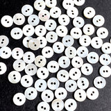 Bulk Deal, 144 Tiny White Buttons: 3/8" Shell 2-Hole 9mm, Butterscotch Backs   # KB-957