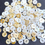 Bulk Deal, 144 Tiny White Buttons: 3/8" Shell 2-Hole 9mm, Butterscotch Backs   # KB-957