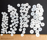 116-120 Buttons: White River Shell Size Mix: 4-Hole.  3/8", 9/16", 5/8", 13/16".   # LP-111