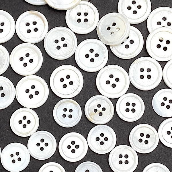 Re-Stocked Bulk Deal; 116-120 Buttons: White River Shell Size Mix: 4-Hole.  3/8", 9/16", 5/8", 13/16".   # LP-111
