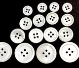 116-120 Buttons: White River Shell Size Mix: 4-Hole.  3/8", 9/16", 5/8", 13/16".   # LP-111