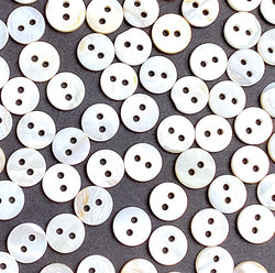 Re-Stocked, White, Some with Butterscotch Backs, 3/8" River Shell 2-Hole 9mm Button, Pack of 75   # LP-68/75