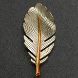 Re-Stocked Feather Button, Small, Silver and Gold 1-1/8" by Susan Clarke  #SC-997