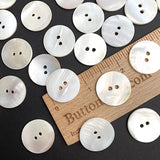 Re-Stocked, White River Shell 7/8"-15/16" Iridescent Pearl Shell Round 2-Hole Buttons, 22/23mm, $.75 each.   # LP-73
