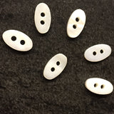Re-Stocked White Oval Shell 2-Hole Tiny 1/2" Button.  Pack of TEN Buttons #LP-01